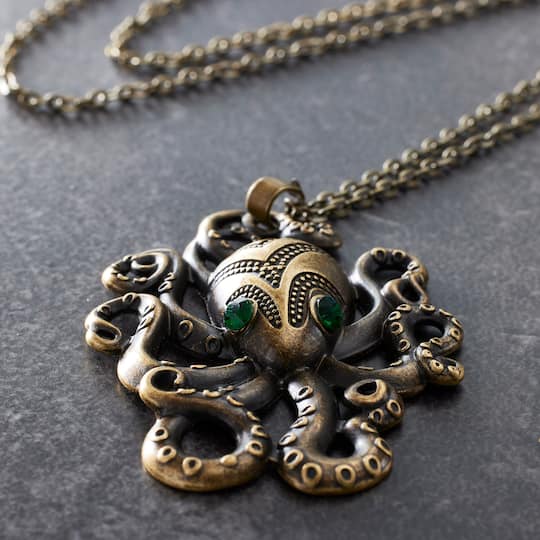 12 Pack: Found Objects™ Antique Brass Octopus Pendant by Bead Landing™